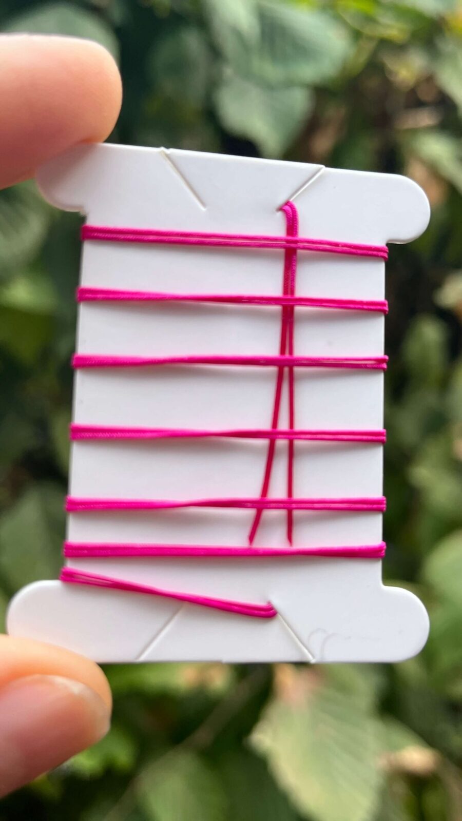 1 Meter Flechtschnur mit präparierten Spitzen 0,5 mm - magenta
