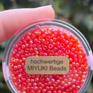 hochwertige japanische Miyuki Rocailles 2,2mm transp. orange rainbow