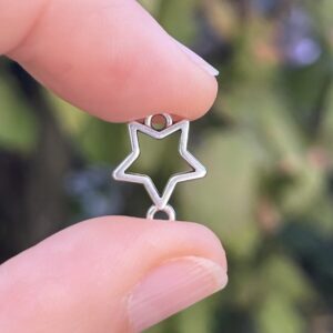 1 Stück Metallzwischenteil Stern 999 versilbert